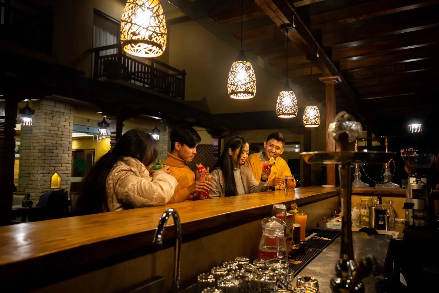 Guests at the bar at night