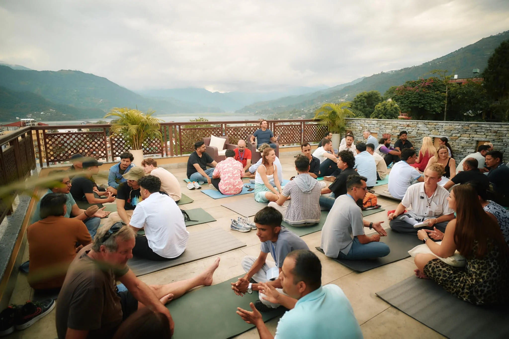 Guests seated for a session on the rooftop
