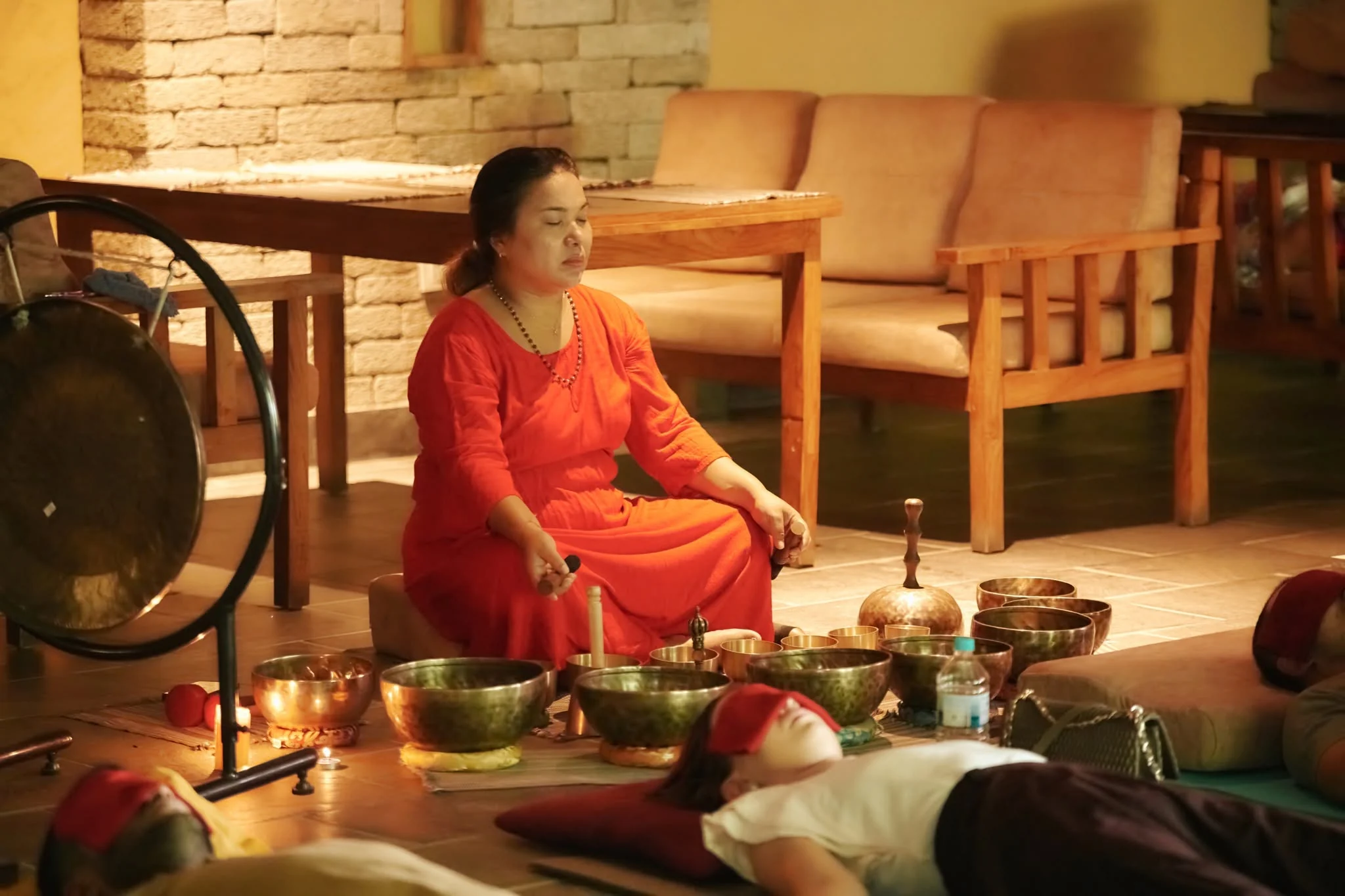 A singing-bowl sound bath during the summit