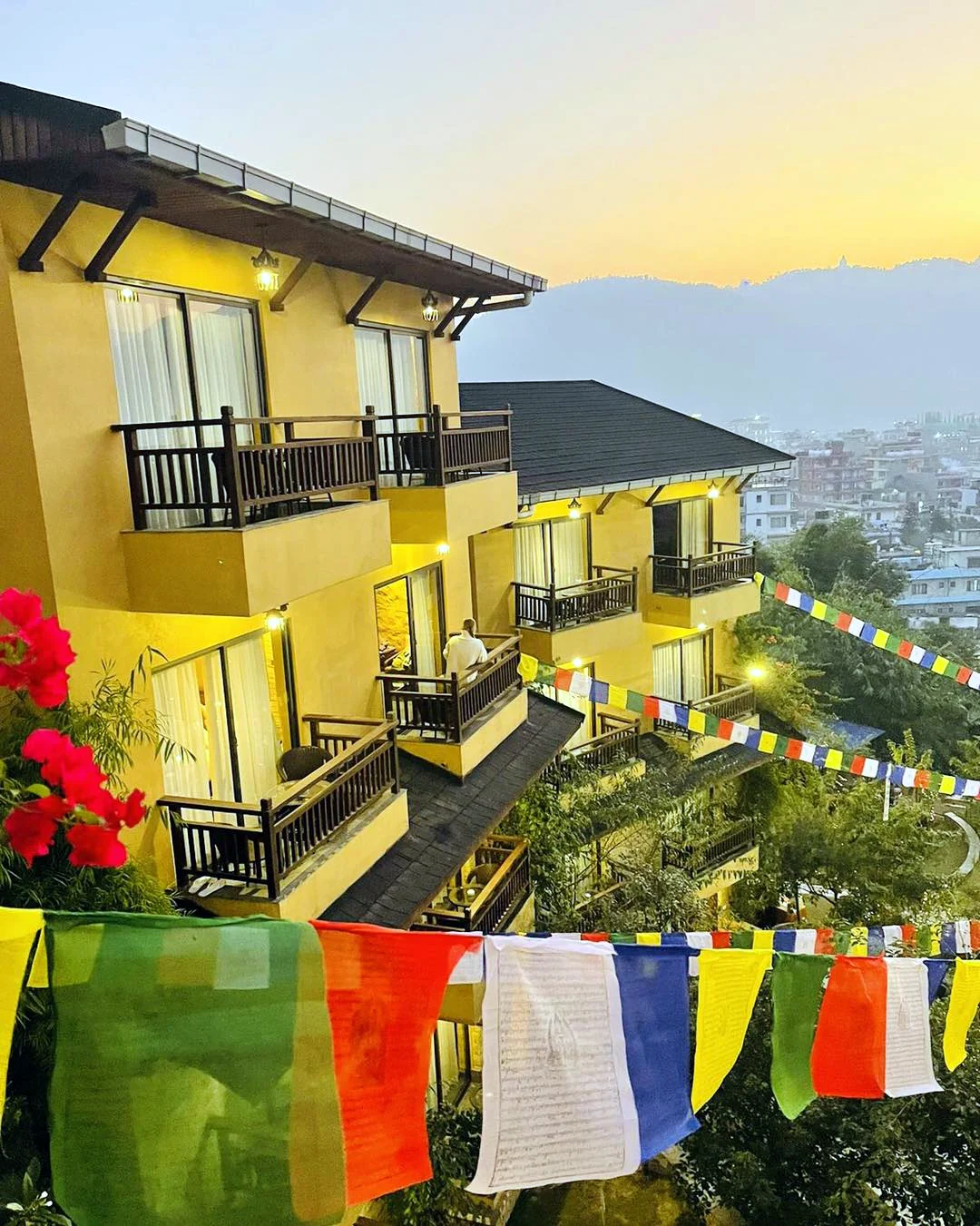 The resort at sunset with prayer flags