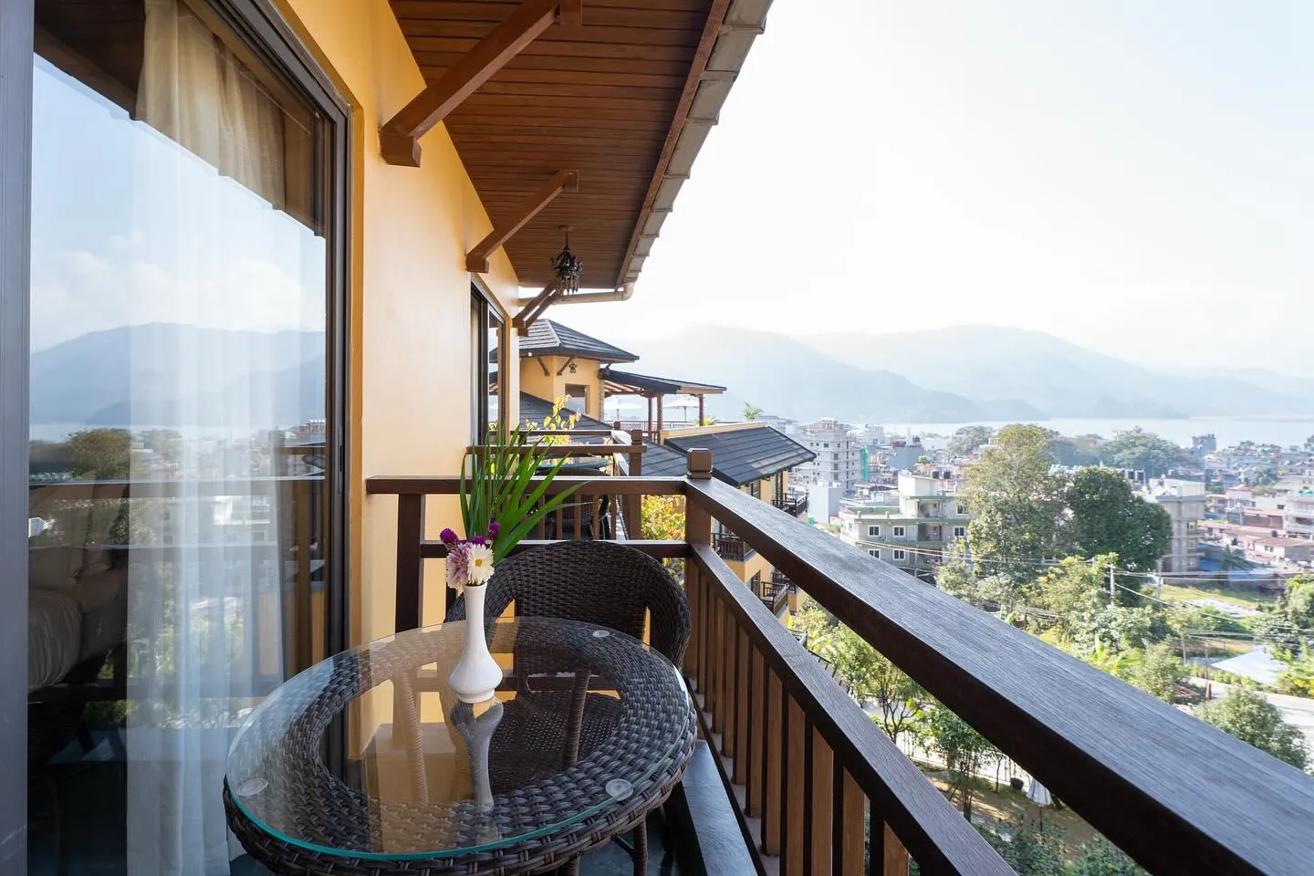 Balcony seating overlooking the lake and the city
