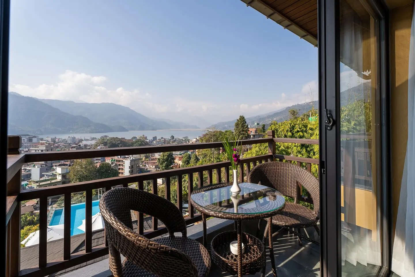 Morning view over Phewa Lake from a room balcony at Bar Peepal Resort