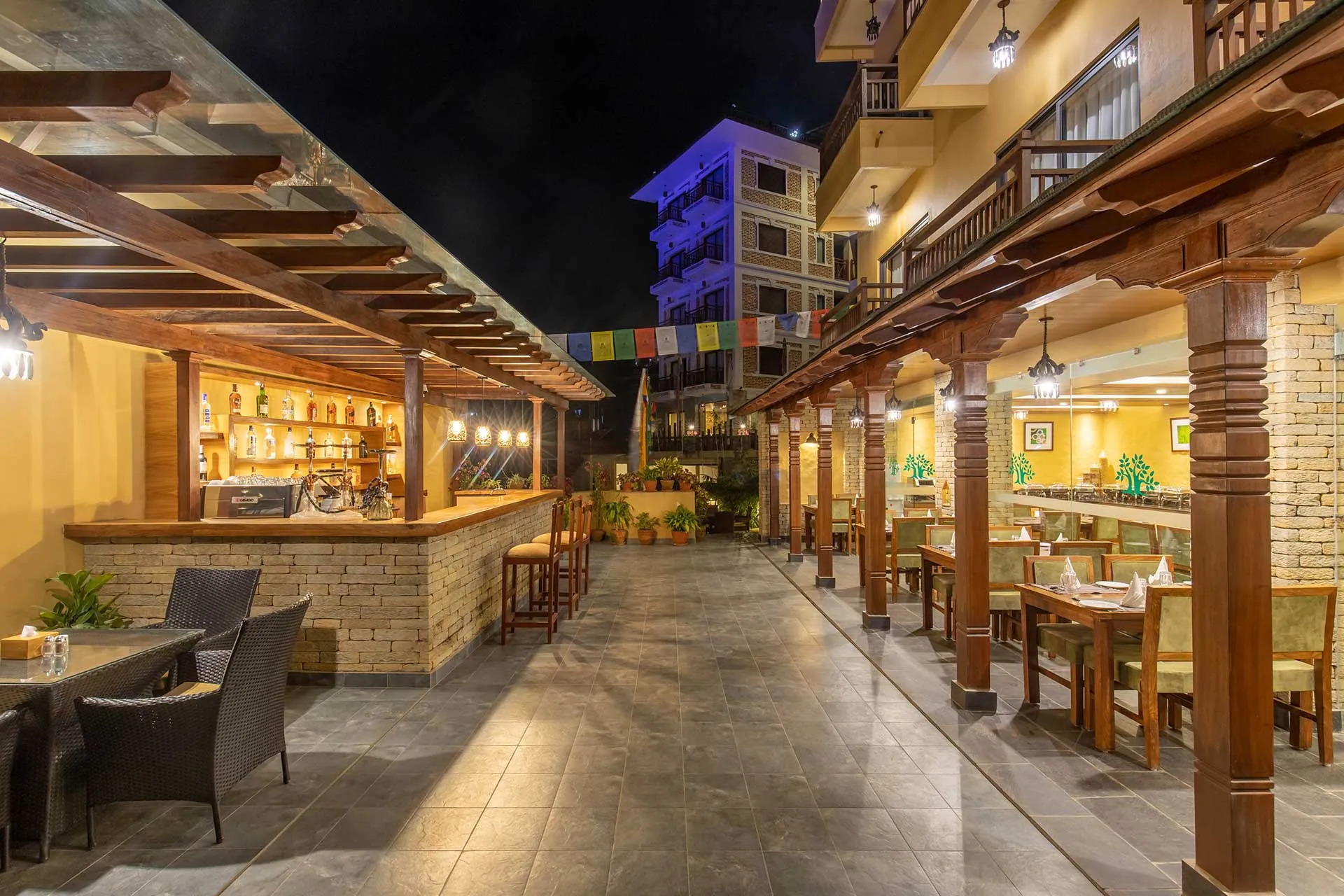 The Chautari courtyard and bar lit up at night