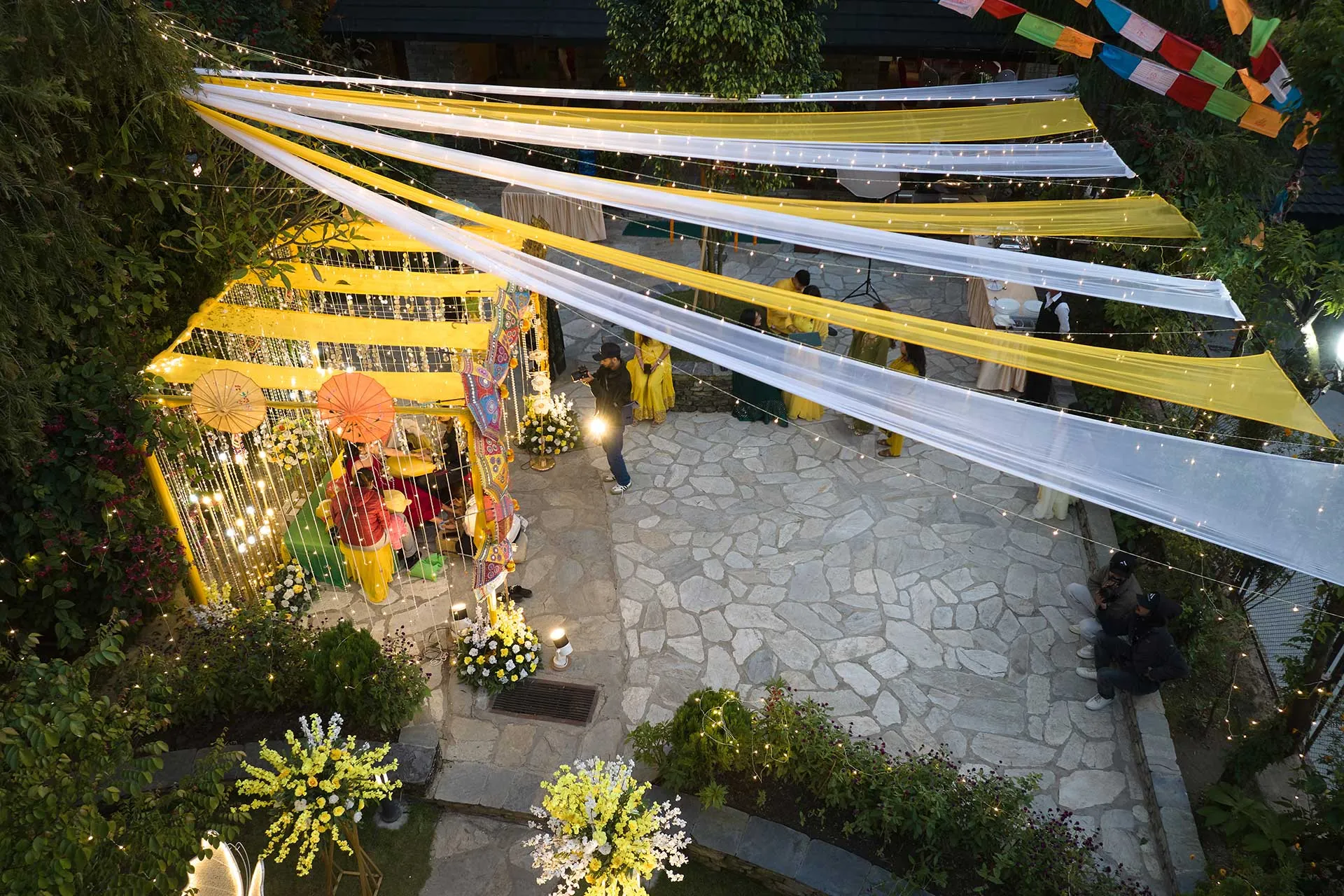 Prayer flags over the garden event lawn