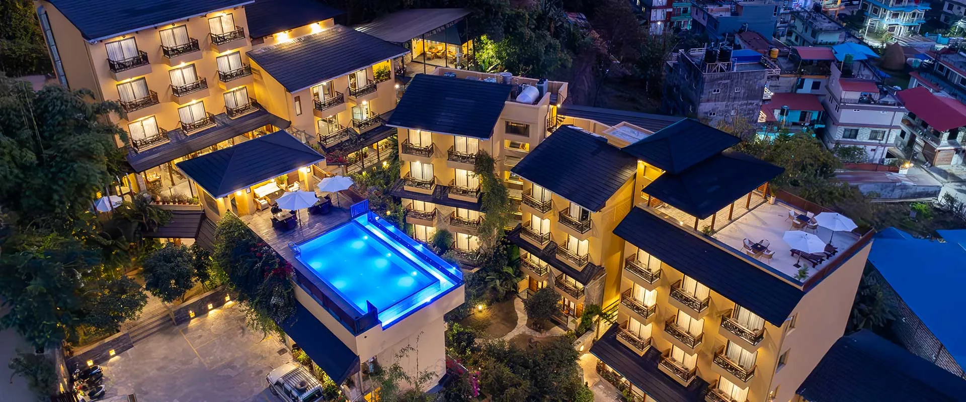 The resort lit up at night, seen from above