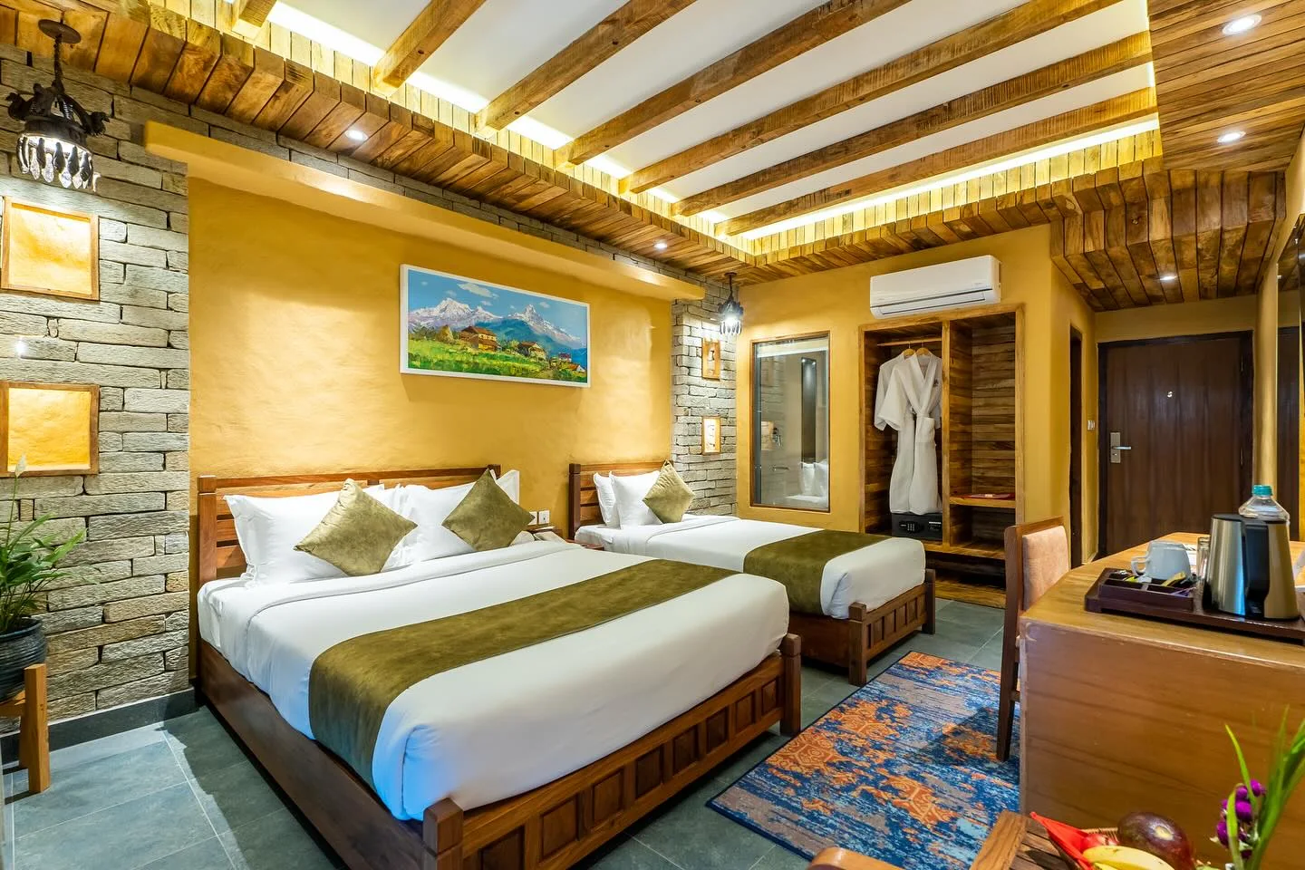 Executive Suite bedroom under a lit timber ceiling